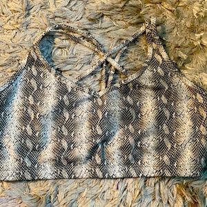 Never worn pure barre snake skin sports bra